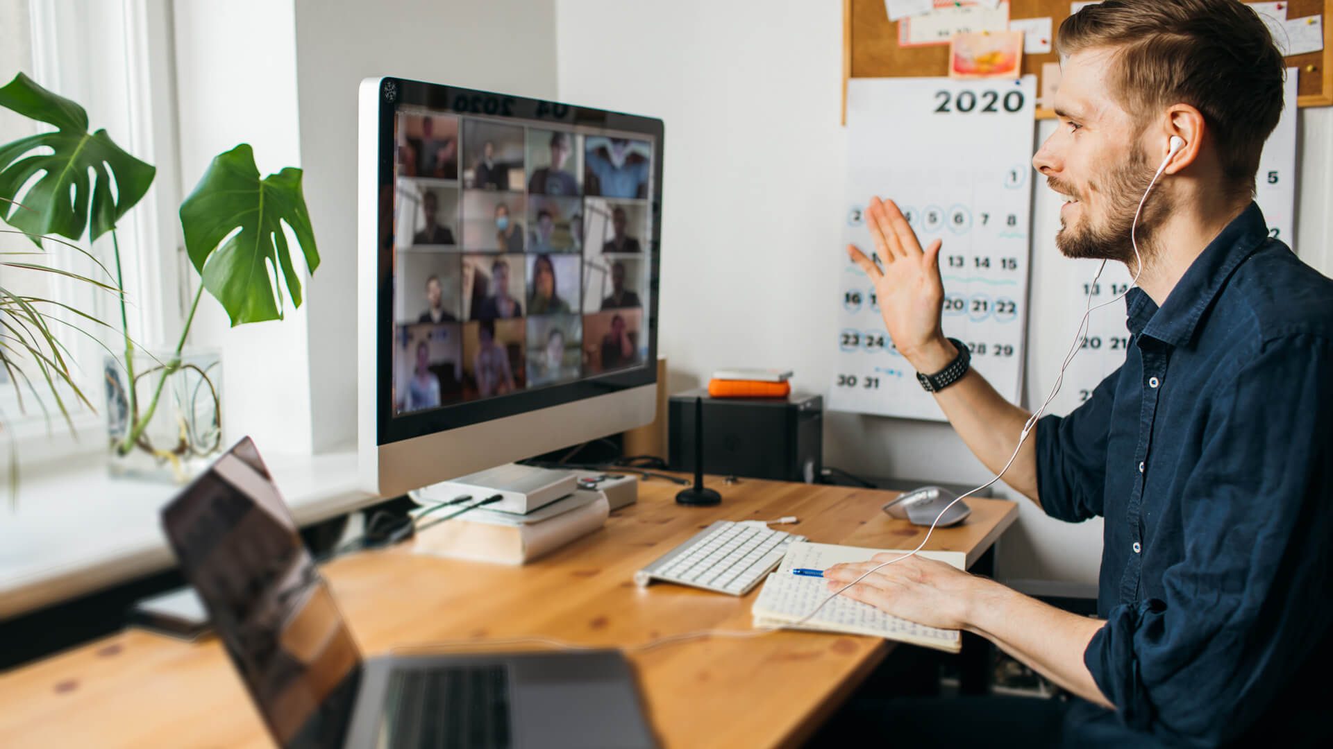 man attending online meeting while WFH