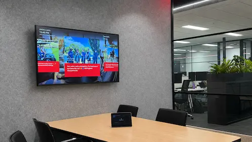 Digital signage content centrally managed across multiple Microsoft Teams Room screens